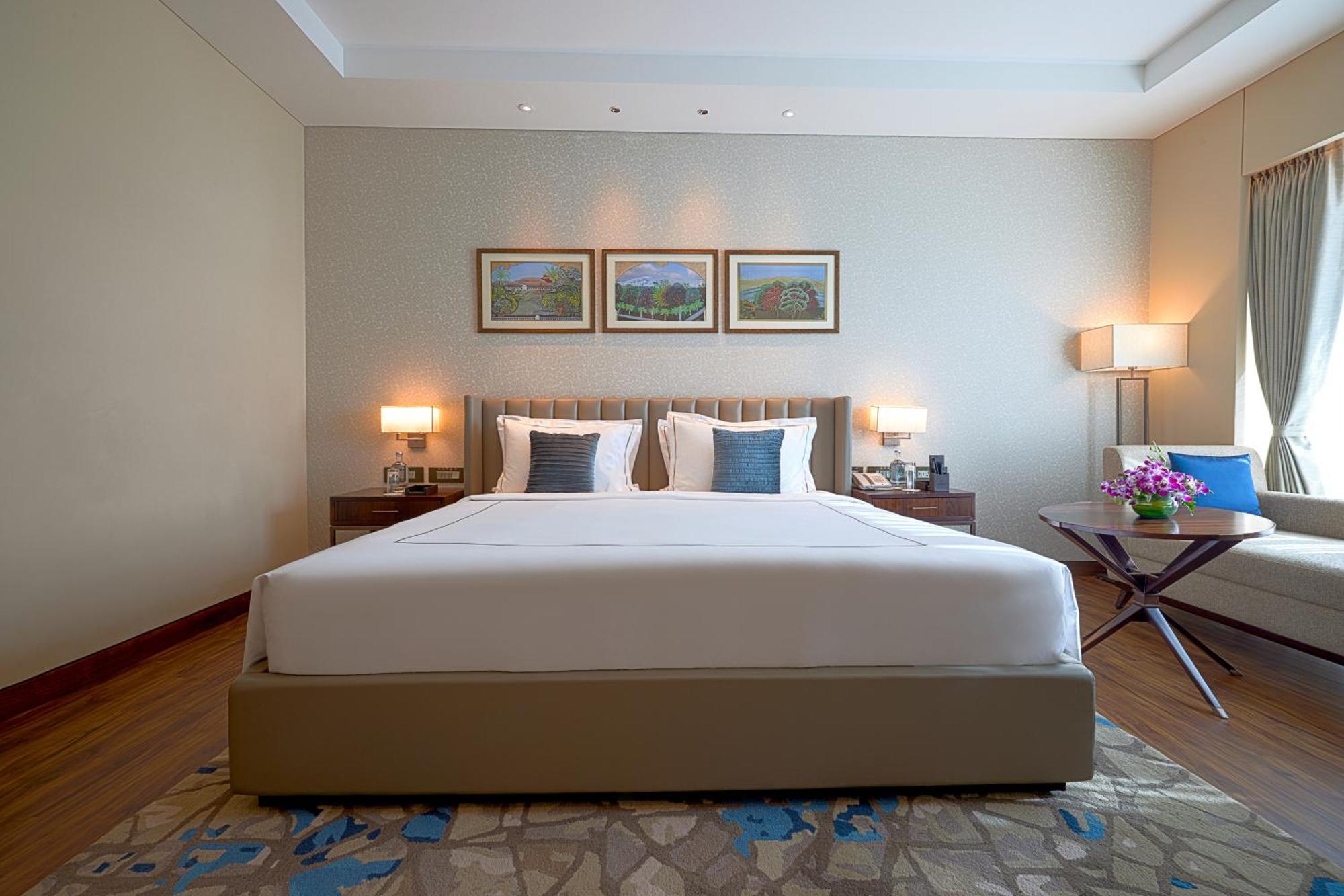 Taj Bangalore Devanahalli Exterior foto A bedroom at the Taj Bengal