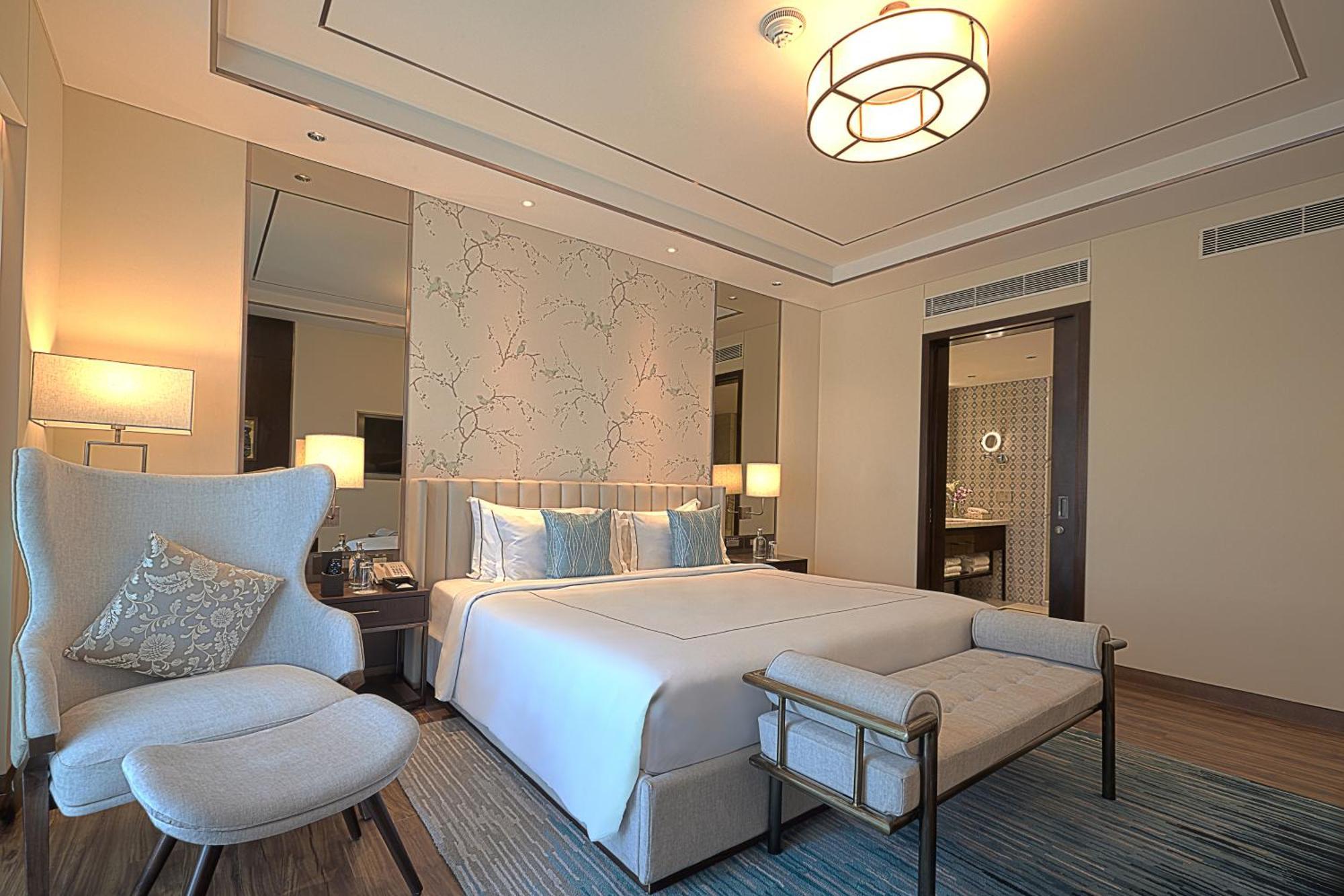 Taj Bangalore Devanahalli Exterior foto A bedroom at the hotel