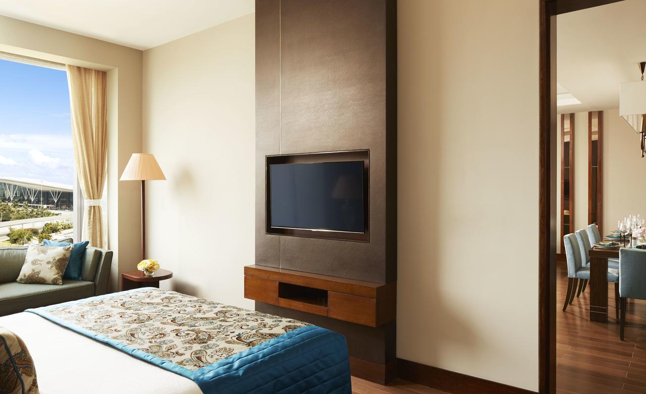 Taj Bangalore Devanahalli Exterior foto A television set in a hotel room